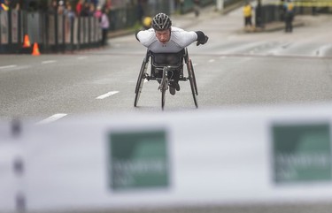 Tristan Smyth finishes first in men's wheel chair race as about 40,000 athletes competed in 2017 Vancouver Sun Run in Vancouver, B.C., April 23, 2017.