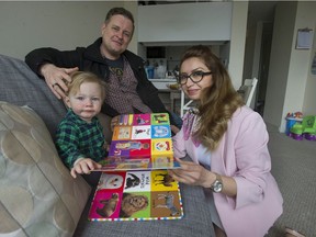 Paul Donnett with his son Leo with Nahid Zohdi, at the daycare she runs from her rental apartment in the West End.