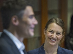 Newly appointed Chief Resilience Officer Katie McPherson smiles as mayor Gregor Robertson speaks earlier this week.