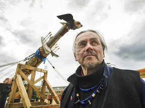 Jim Hart with his totem pole art at UBC in Vancouver, B.C., March 31, 2017.