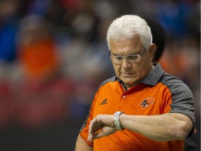 VANCOUVER July 07 2016.  BC Lions head coach Wally Buono looks at his watch as the Lions start to play the Toronto Argonauts in a regular season CFL football game at BC Place Vancouver, July 07 2016. ( Gerry Kahrmann  /  PNG staff photo)  ( For Prov / Sun Sports )  00044062A [PNG Merlin Archive]