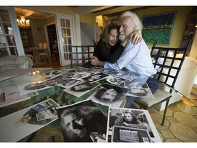 Max Wyman and Susan Mertens go through his old Sun and Province photo files at their home in Lions Bay.