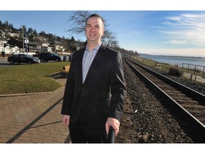 White Rock Coun. Grant Meyer stands by the rail crossing at Bay Street in White Rock, one of four pedestrian crossings that will be upgraded.