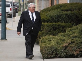 Winston Blackmore, who is accused of practising polygamy in a fundamentalist religious community, returns to court after a lunch break in Cranbrook, B.C.