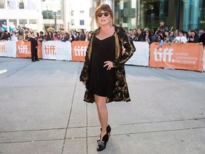 Actress Mary Walsh poses for a photograph on the red carpet at the gala for the new movie &ampquot;The Grand Seduction&ampquot; during the 2013 Toronto International Film Festival in Toronto on Sunday, Sept. 8, 2013. With its hardscrabble St. John&#039;s setting, Mary Walsh&#039;s debut novel, &ampquot;Crying for the Moon,&ampquot; contains some personal elements for the Canadian comedy star.THE CANADIAN PRESS/Nathan Denette
