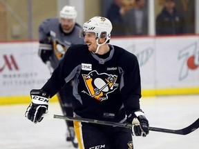 Pittsburgh Penguins Sidney Crosby smiles during NHL practice, Friday, May 5, 2017, at the team&#039;s practice facility in Cranberry, Pa. It was Crosby&#039;s first time back on the ice since he suffered a concussion in Game 3 of Pittsburgh&#039;s playoff series against Washington. It&#039;s still uncertain whether he will be available for Game 5 on Saturday night in Washington. (AP Photo/Keith Srakocic)
