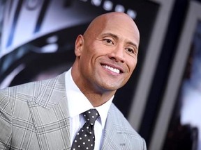 FILE - In this May 26, 2015, file photo, Dwayne Johnson arrives at the premiere of &ampquot;San Andreas&ampquot; at the TCL Chinese Theatre in Los Angeles. Johnson told GQ for a story published May 10, 2017, that he is seriously considering a run for president. (Photo by Richard Shotwell/Invision/AP, File)