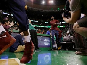 Cleveland Cavaliers forward LeBron James takes the floor for Game 1 of the NBA basketball Eastern Conference finals against the Boston Celtics, Wednesday, May 17, 2017, in Boston. (AP Photo/Charles Krupa)