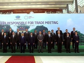 Vietnamese Prime Minister Nguyen Xuan Phuc, center in front row, ministers and officials pose for a group photo, at the Asia-Pacific Economic Cooperation (APEC) Trade ministerial meeting in Hanoi, Vietnam Saturday, May 20, 2017. The Pacific Rim trade ministers started their two-day meeting in Hanoi focusing on free trade and regional economic integration amid fears of growing trade protectionism. (AP Photo/Hau Dinh)