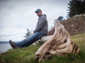 Firefighter Joel McNair, of Saskatoon, Sask., sits for a photograph at the Sunshine Coast Health Centre in Powell River, B.C., on Thursday March 16, 2017.