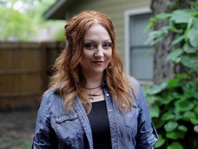 In this Tuesday, May 23, 2017, photo, Dawn Erin poses for a photo at her home, in Austin, Texas. Erin was among more than 20 million Americans who gained coverage under Affordable Care Act. The health law helped push uninsured rates to historic lows and also aimed to bring the newly insured back into the primary care system to improve their health. (AP Photo/Eric Gay)