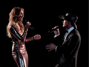 Recording artists Faith Hill (L) and Tim McGraw perform during the 52nd Academy of Country Music Awards at T-Mobile Arena on April 2, 2017 in Las Vegas, Nevada.