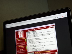 An investigation into a scourge of NetWalker ransomware attacks has led to the arrest of a Canadian man, the U.S. Department of Justice said on Wednesday. A screenshot of the warning screen from a purported ransomware attack is shown in a file photo.
