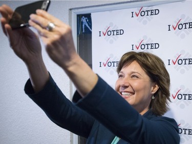 B.C. Liberal leader Christy Clark takes a selfie at a poling station after casting her ballot in Vancouver, B.C., Tuesday, May 9, 2017. The British Columbians head to the polls today.