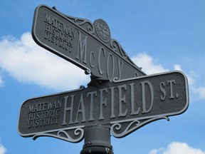 A street sign in Matewan, W.Va., bears the names of two families that once waged the country's most famous feud.