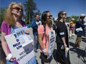 Approximately two dozen BC Nurses Union members marched on their own union's offices in Burnaby on Thursday.