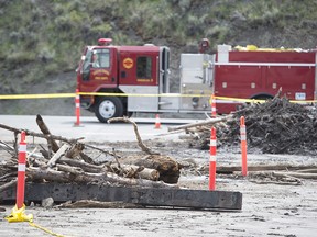 Flood debris is seen on the road in Cache Creek, B.C., Saturday, May 6, 2017. The small B.C. community was hit this week with flooding from melting snow pack.