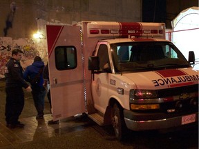 An ambulance delivers a patient to a mobile emergency facility in Vancouver's Downtown Eastside in December 2016. The tent, staffed by emergency and addictions physicians, was set-up by the government health authority to help tackle the fentanyl crisis.