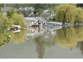 Residents with houses along Duck Lake, also known as Ellison Lake, are seeing water creep up to the edges of their property.
