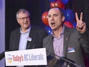 Norm Letnick, re-elected a MLA for Kelowna-Lake Country speaks to supporters at the Coast capri Hotel as Steve Thomson looks on, Thomson was also re-elected as MLA for Kelowna-Mission on Tuesday evening.