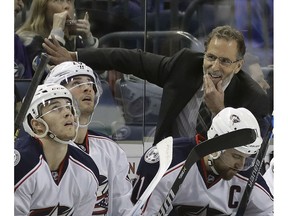 FILE - In this Jan. 13, 2017, file photo, Columbus Blue Jackets head coach John Tortorella watches from behind the bench during the third period of an NHL hockey game against the Tampa Bay Lightning in Tampa, Fla. The patience has paid off: Picked by most analysts to finish near the bottom again, the Blue Jackets shattered franchise records for wins and points, and will be in the Stanley Cup playoffs that begin next week.