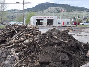 Flood debris is seen on the road in Cache Creek. The small B.C. community was hit last week with flooding from the melting snowpack. Much of the Interior is on alert again this weekend.