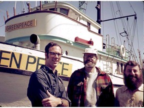 Greenpeace founders (left to right) Paul Cote, Jim Bohlen, and Irving Stowe in 1971, before Greenpeace's maiden voyage to Amchitka. The ship in the back was the Phyllis Cormack, which was renamed The Greenpeace for the voyage. Robert Stowe photo.