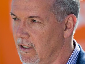 NDP Leader John Horgan speaks during a campaign stop outside a hospital in Oliver, B.C., on Saturday May 6, 2017. A provincial election will be held on Tuesday.