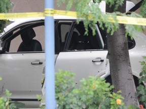 The Porsche Cayenne in which Jonathan Bacon was shot dead in Kelowna on Aug. 14, 2011.
