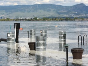 A dock lies under water at Casa Loma Beach Park in West Kelowna on Thursday, May 18, 2017.