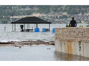 Watt Road home owners survey damage. The water level for B.C.'s Okanagan Lake has crept up another 1.7 centimetres since Sunday, adding to flooding concerns across the Central Okanagan Regional District.