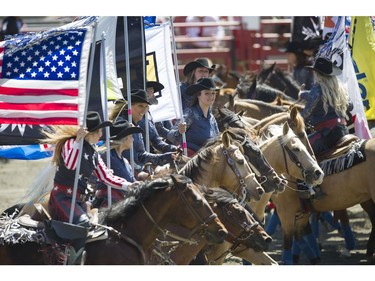 Here the womens drill team opens the start of the show, at the 71st annual Cloverdale Rodeo and Country Fair.