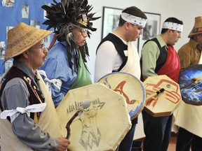 FILE PHOTO Drumming and singing occur as members of Capilano Little Ones School with local officials and members of the Aboriginal community and the North Vancouver school district signs its 2nd Aboriginal Education Enhancement Agreement  in North Vancouver to mark Aboriginal Day on Friday,June 21, 2011. The great-aunt of a boy who spent a school day there tied at the ankle to another student is going to court in a bid to overturn a decision by the B.C. Commissioner for Teacher Regulation to take no action against the teacher.