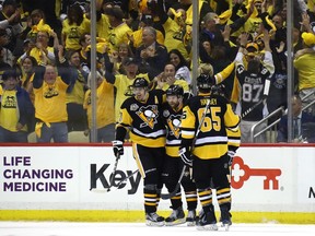 PITTSBURGH, PA - MAY 15:  Phil Kessel #81 of the Pittsburgh Penguins celebrates with his teammates after scoring a goal against Craig Anderson #41 of the Ottawa Senators during the third period in Game Two of the Eastern Conference Final during the 2017 NHL Stanley Cup Playoffs at PPG PAINTS Arena on May 15, 2017 in Pittsburgh, Pennsylvania.