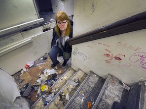 Wendy Pederson in a fire escape stairwell at the Balmoral Hotel SRO in the Downtown Eastside.