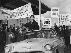 Progressive Conservative MP for Vancouver-Centre Douglas Jung is welcomed by a crowd of supporters at Vancouver airport in 1958 after a whirlwind speaking tour of Canada.