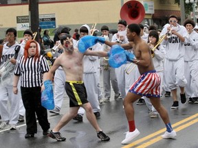 The Kentlake High School band performs during the Victoria Day parade in Victoria in 2012. The band won't be attending this year's event after the school board in Kent, south of Seattle, cancelled all international school trips because of confusion over American policy toward undocumented immigrants.