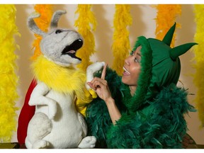 Sarah Roa and Lemon the Rabbit (puppeted by Lissa Neptuno) perform in The Green Wanderer.