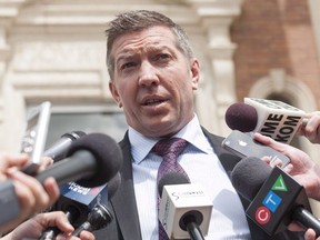 FILE PHOTO Sheldon Kennedy speaks to media outside the Court of Queen's Bench after the trial of Graham James, in Swift Current, Sask., on June 19, 2015. The former NHL hockey player is returning to the Saskatchewan city where he was sexually abused by his junior hockey coach to help protect other kids.