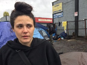 Alexandra Sayers stands by her tent and talks about living on 135A Street, also known as the Surrey Strip. The 21-year-old, who has an addiction, has been living on the Strip for about a year.