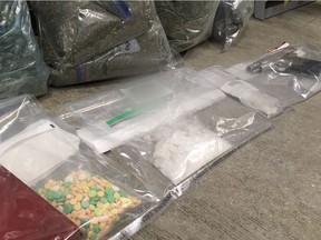 Surrey RCMP carried out multiple search warrants in mid-April at properties alleged to be involved in the street level drug trade. The searches resulted in 13 arrests and the seizure of numerous weapons and significant quantities of drugs. [PNG Merlin Archive]