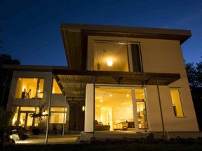 This 3,800-square-foot home, seen from the back in 2016, was the first passive-standard house built on Vancouver Island, and includes 30-centimetre-thick walls.