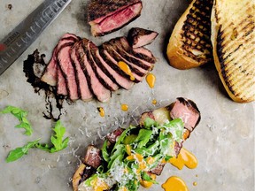 Toasting the bread on the barbecue amplifies the grilled flavor of Stretch the Steak Tartine with Aged Provolone. Lightly dressed arugula provides a cooling contrast.