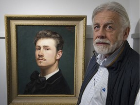Paul Peel III with a self-portrait of his granduncle Paul Peel.
