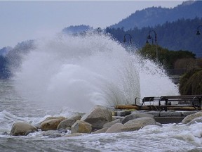 A big wave strikes the seawall at West Vancouver's Ambleside Beach area during high tide in December 2012. B.C. has some of the best wave-energy potential anywhere in the world, researchers say.