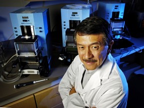 Dr. Victor Ling, a world-renowed cancer scientist, working in the lab at the B.C. Cancer Agency.