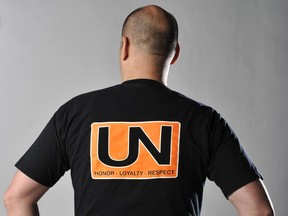 FILE PHOTO Image of T-shirt worn by UN gang members in 2009.