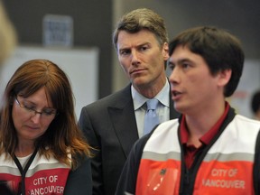 Mayor Gregor Robertson in action on a tour inside the Emergency Operations Centre (EOC) in Vancouver, BC., May 10, 2017. The EOC is a facility designed to act as the coordination and communications centre for any large emergency or disaster events that affect Vancouver. (NICK PROCAYLO/PostMedia)  00049108A ORG XMIT: 00049108A [PNG Merlin Archive]