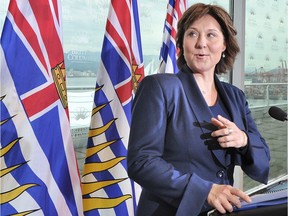Premier Christy Clark holds a post-election press briefing in Vancouver on May 10, 2017, one day after her party won 43 seats.