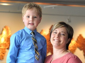 Organ recipient Coen Wallace and his mother, Tanis Burghardt, pose for a photo in Vancouver on Monday as David Foster announces the lineup for his 30th anniversary foundation gala.